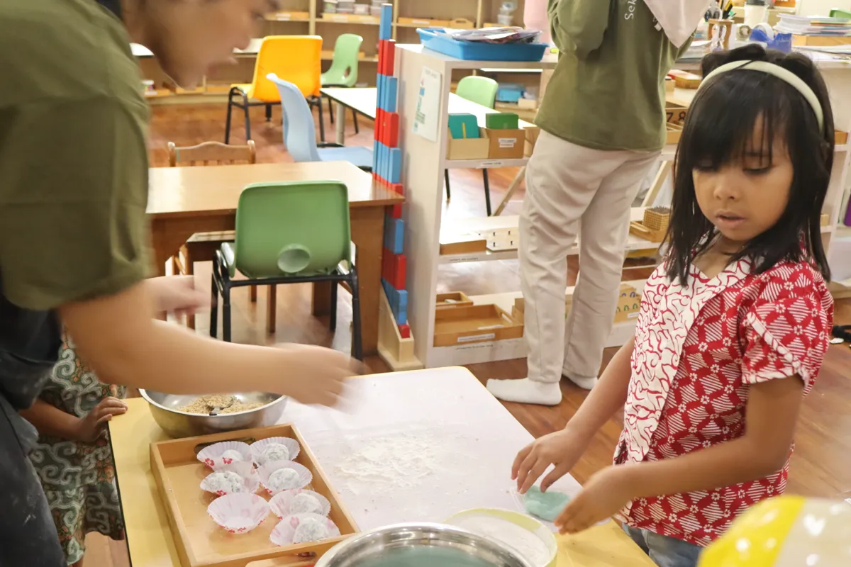 Children sharing a meaningful learning experience at Pascal Montessori