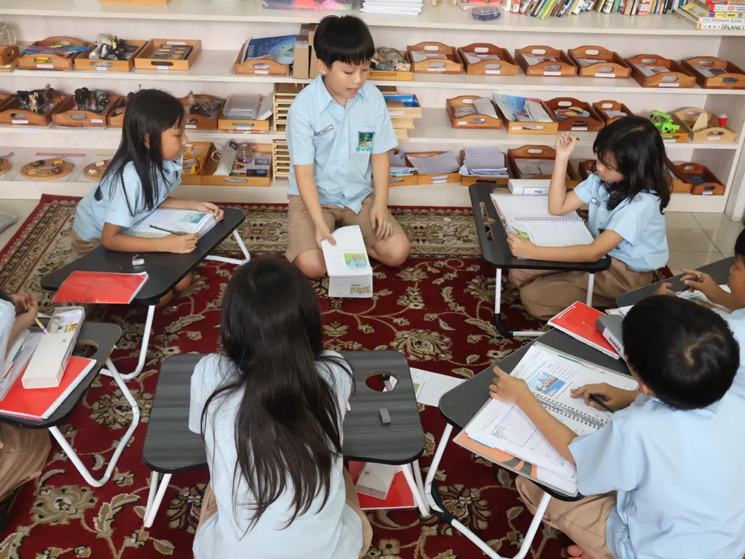 Children learning and interacting together at Pascal Montessori